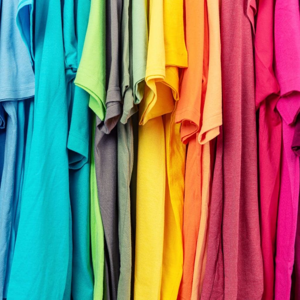 Bright coloured t.shirts ordered by colour.